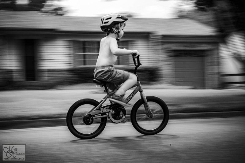 Documentary Photography, boy on bike