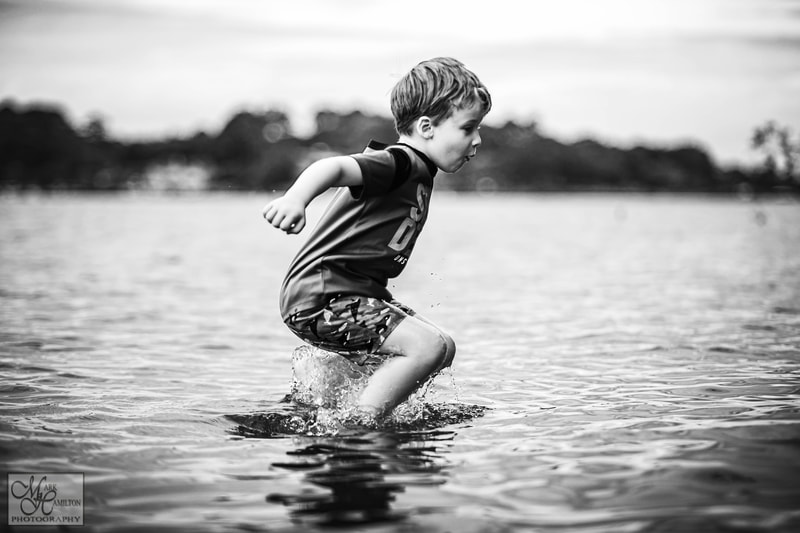 Documentary Photography, boy in water